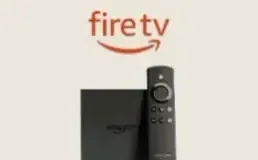 Amazon Fire TV Stick next to its remote